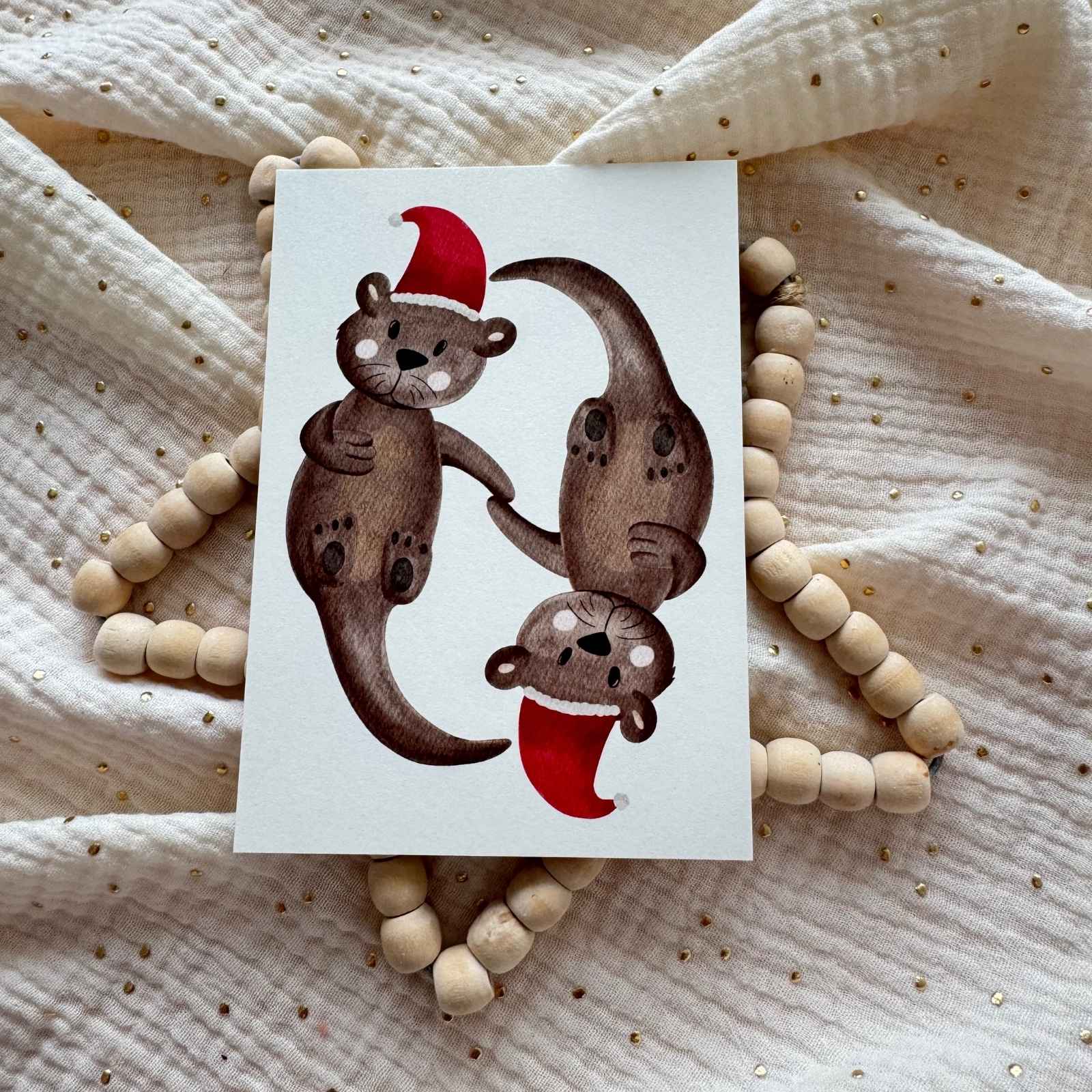 Weihnachtskarte Otter