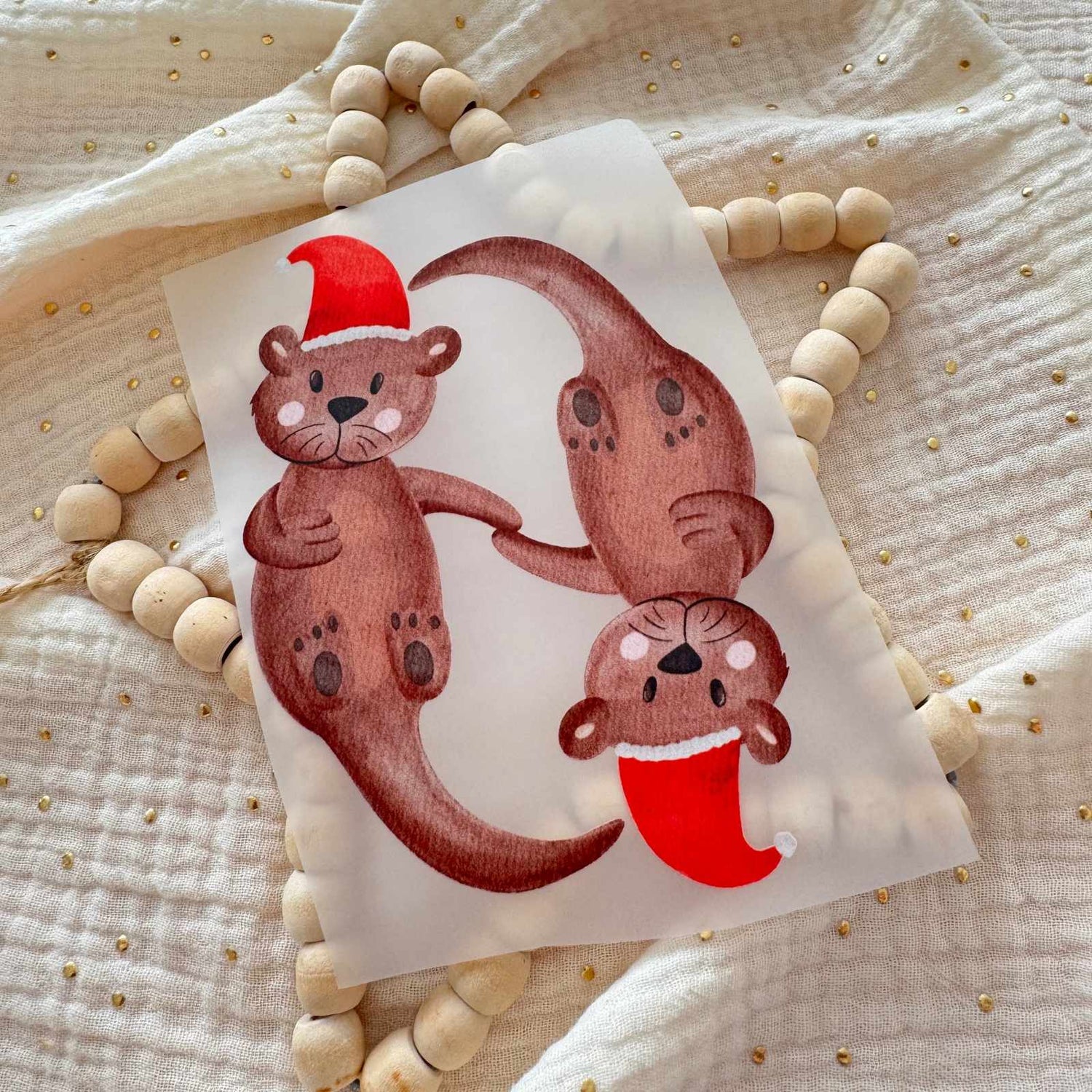 Bügelbild Otter Weihnachten